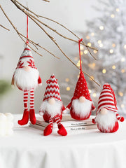 A pair of Santa Claus plush fabric dolls, Santa Claus pendants