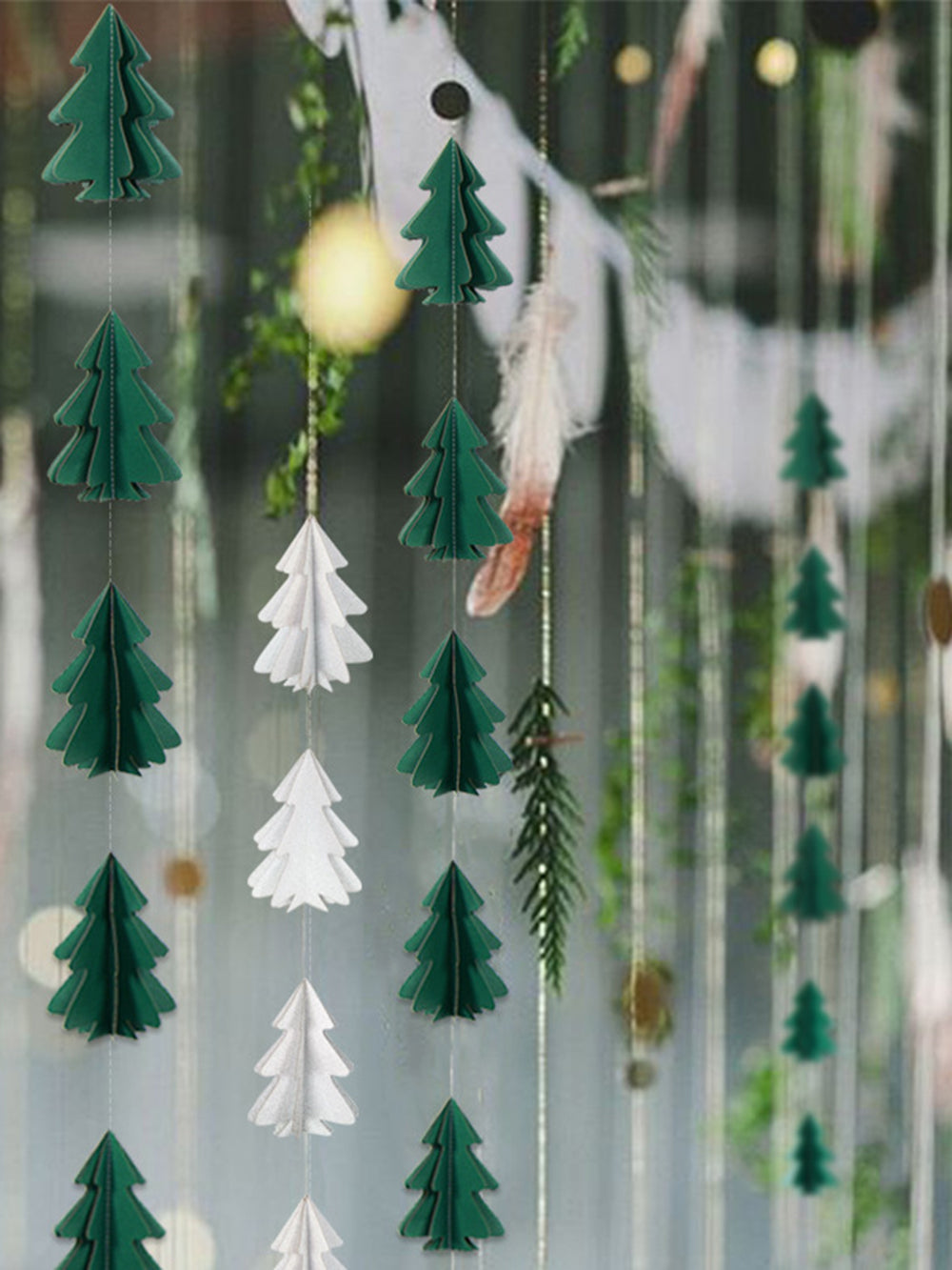 Mini Christmas Tree With Paper String Flowers And Hanging Flags