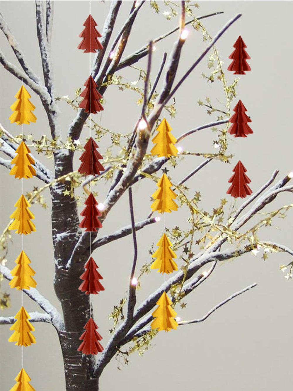 Mini Christmas Tree With Paper String Flowers And Hanging Flags