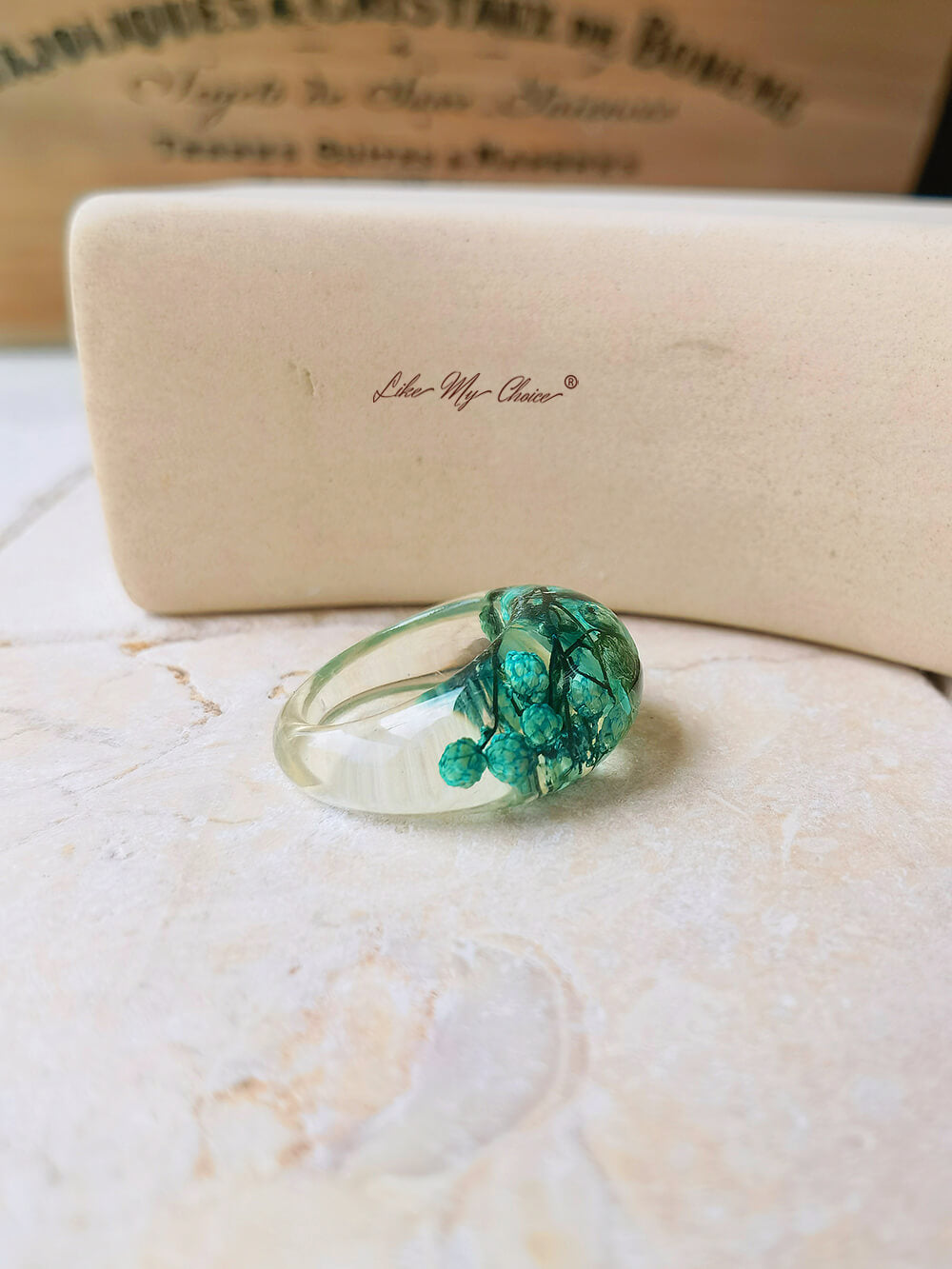 Dried flower resin ring with green flowers