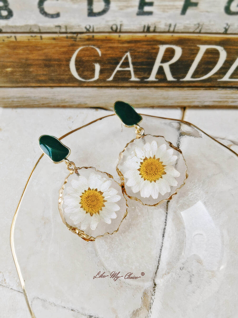 Gold edged daisy earrings