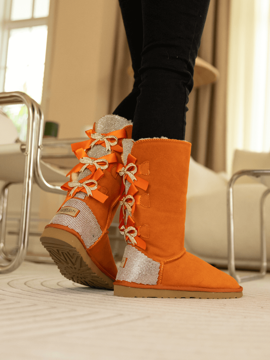 SMAIBULUN Ugg | Rhinestone Ribbon Tri-Tie Bow Suede Boots - Orange