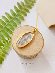 Forget Me Not Golden Oval Pendant  Natural Resin Necklace