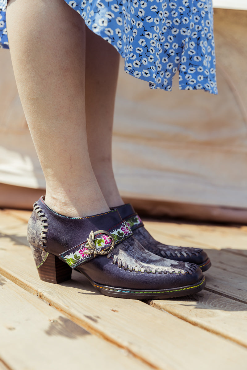 SOFFIA | Navy Leather Floral Strap-Accent Bootie