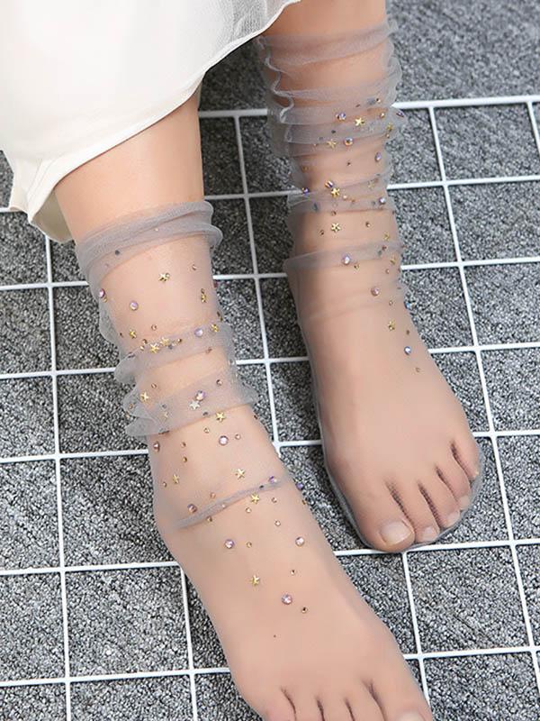 Diamond-Encrusted Perspective Mesh Star Stocking