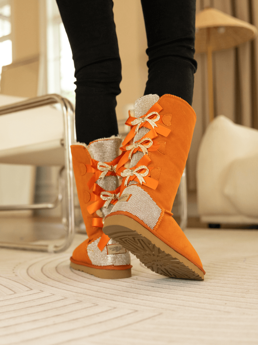 SMAIBULUN Ugg | Rhinestone Ribbon Tri-Tie Bow Suede Boots - Orange