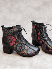 RUMOUR HAS IT | LACE-UP FLORAL EMBOSSED LEATHER BOOT - BLACK