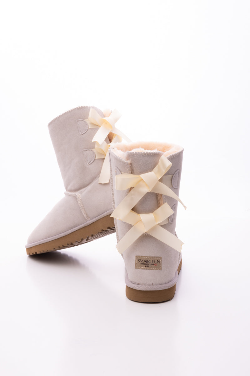 Smaibulun Ugg | Double Ballet Ribbon Bow Suede Shearling Boots - Ivory