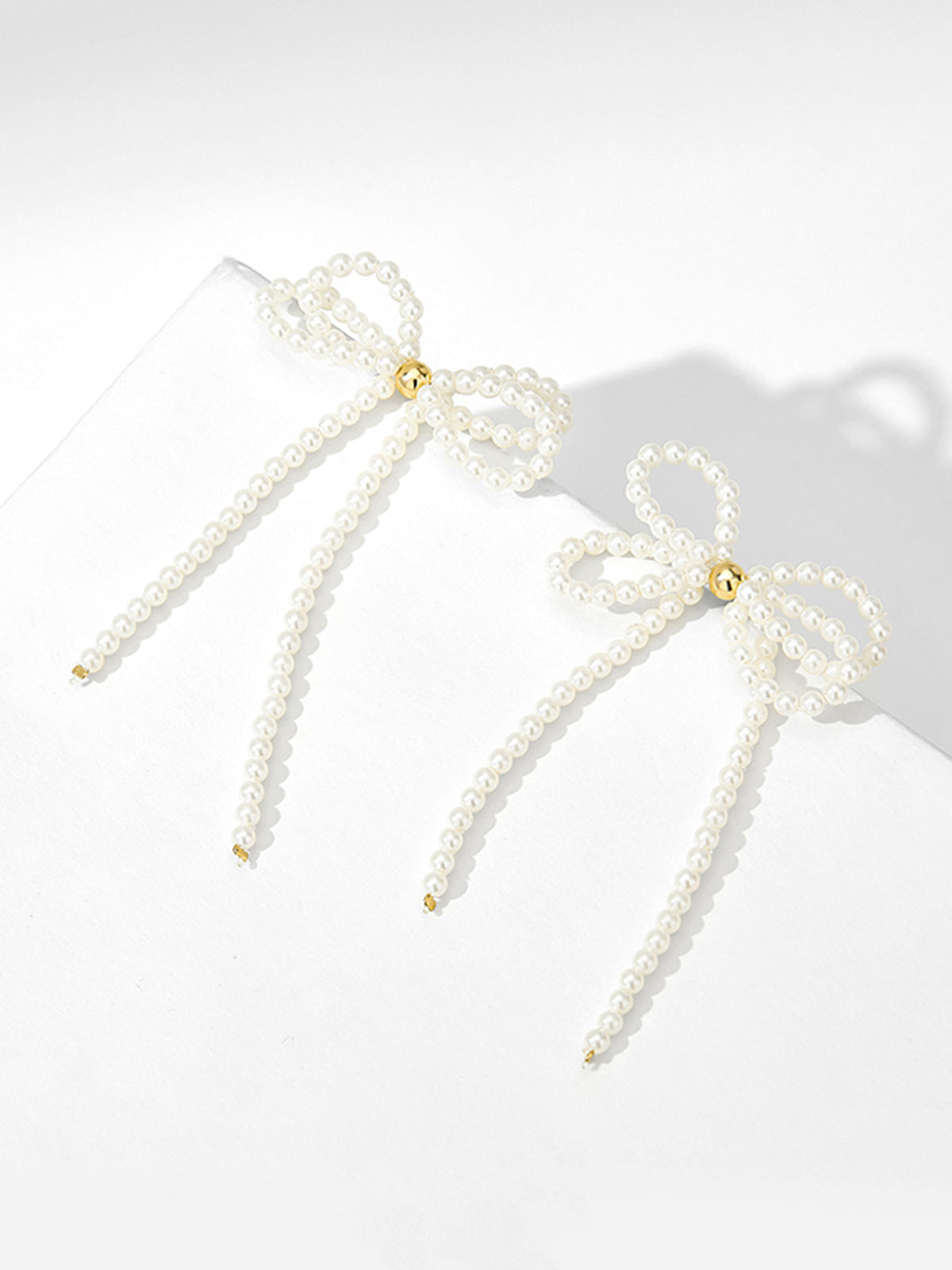 Bow Pearl Tassel Earrings