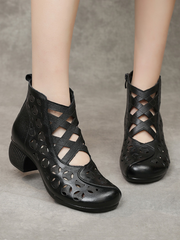 Rumour Has It | Criss-Cross Upper Cut-Out Black Leather Boots