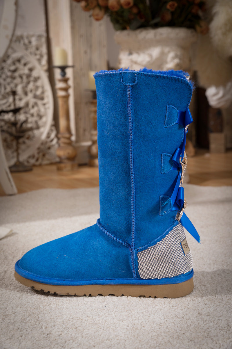 SMAIBULUN Ugg | Rhinestone Ribbon Tri-Tie Bow Suede Boots - Blue