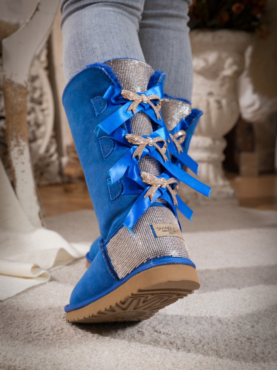 SMAIBULUN Ugg | Rhinestone Ribbon Tri-Tie Bow Suede Boots - Blue