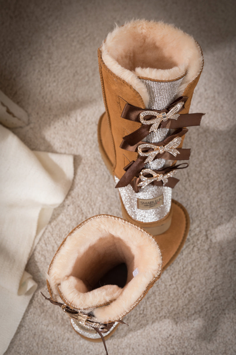 SMAIBULUN Ugg | Rhinestone Ribbon Tri-Tie Bow Suede Boots - Chestnut