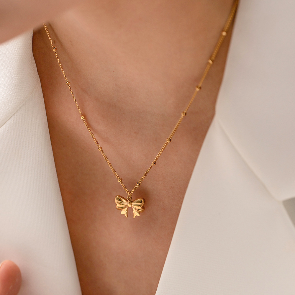 Elara Gold Bow Necklace