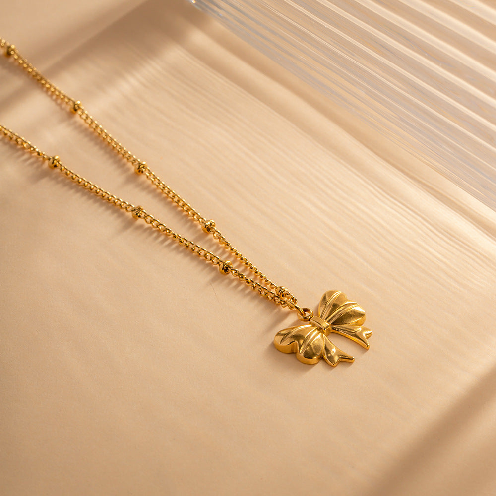 Elara Gold Bow Necklace