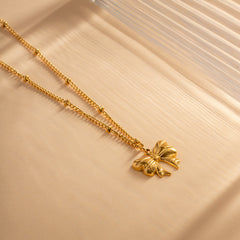 Elara Gold Bow Necklace