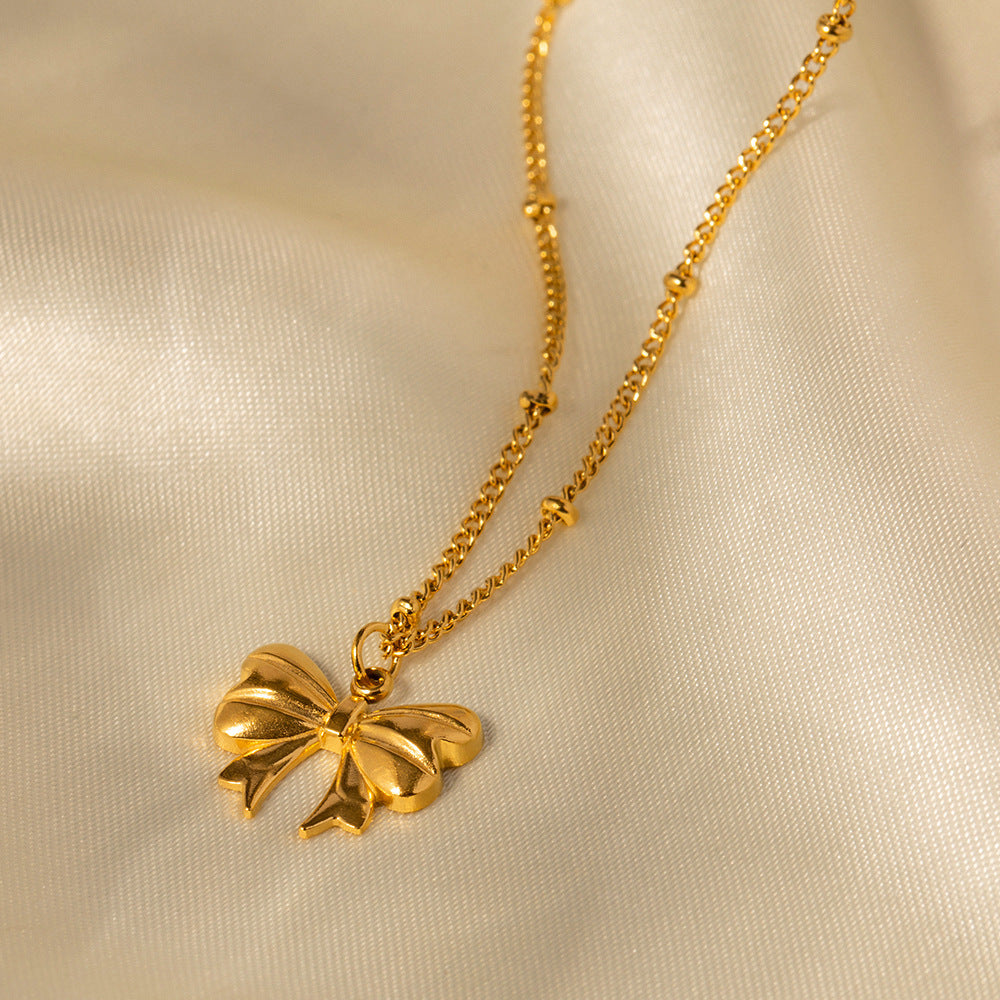 Elara Gold Bow Necklace