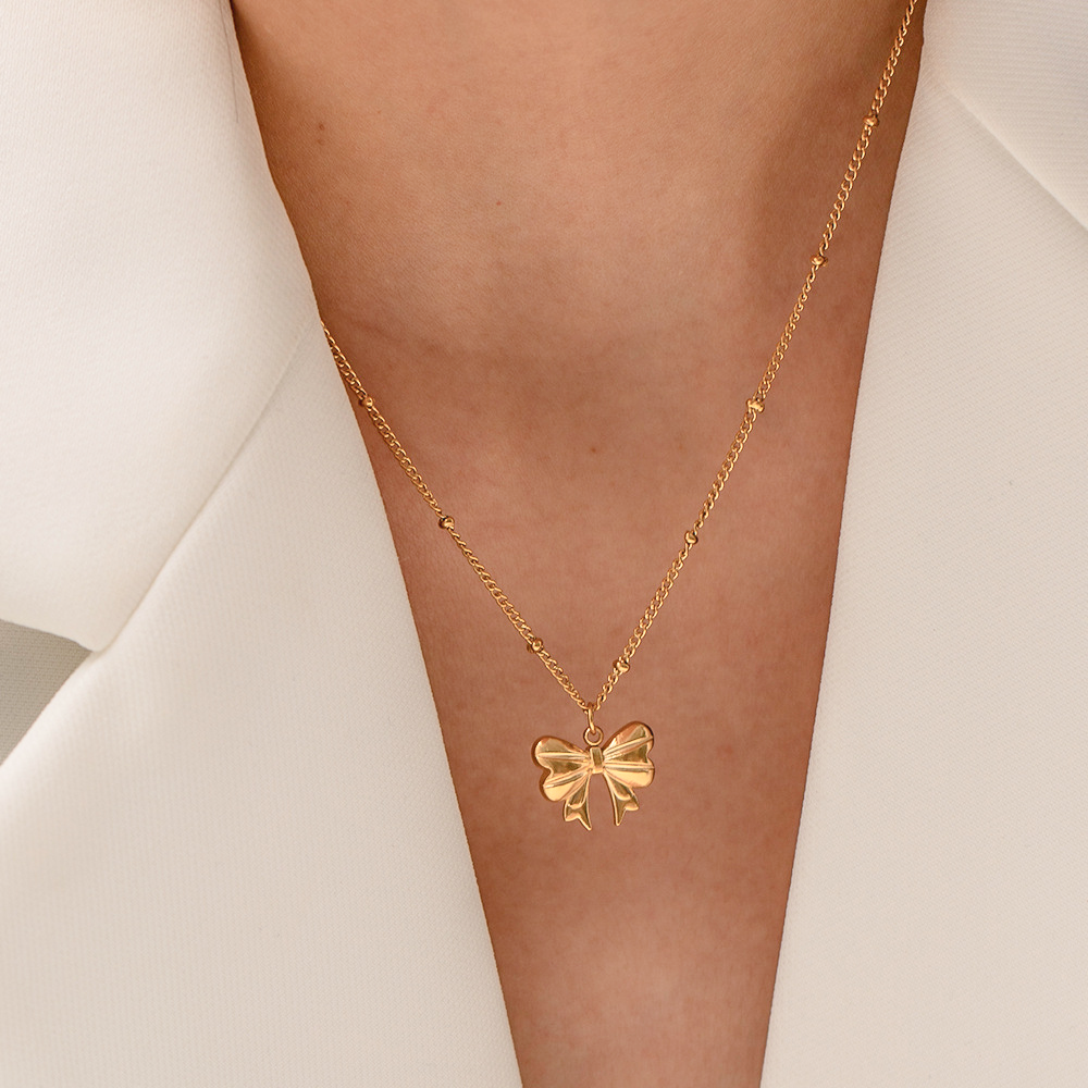 Elara Gold Bow Necklace