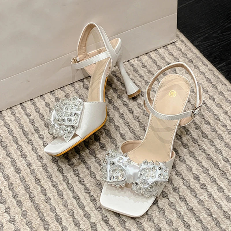 Liyke White Sandals: 9CM Gladiator High Heels with Crystal Bowknot for Women – Square Toe Party Dress Shoes