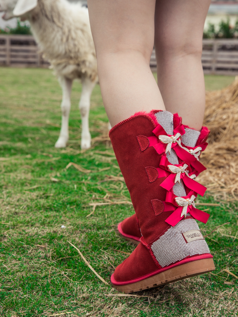 SMAIBULUN Ugg | Rhinestone Ribbon Tri-Tie Bow Suede Boots - Red