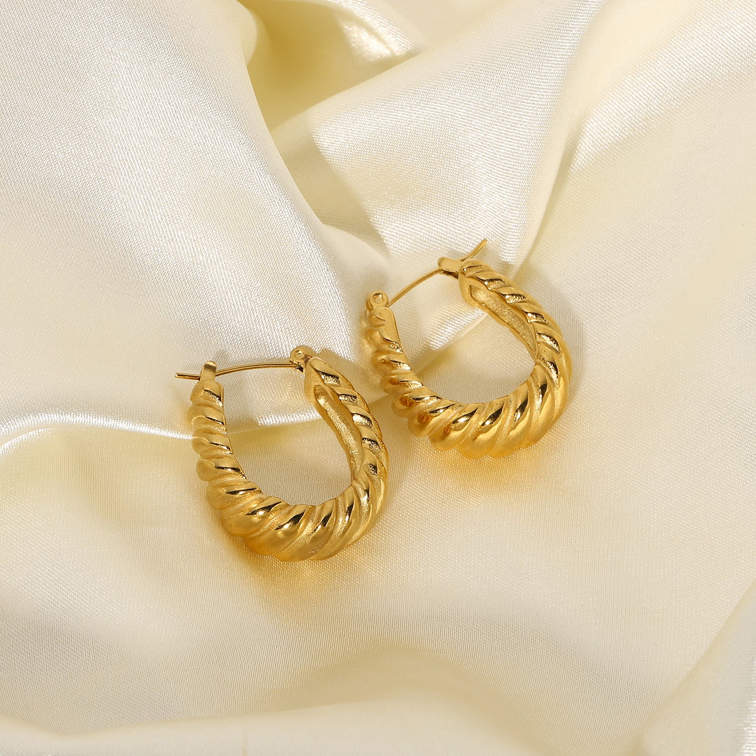 Valencia Swirl Gold Earrings