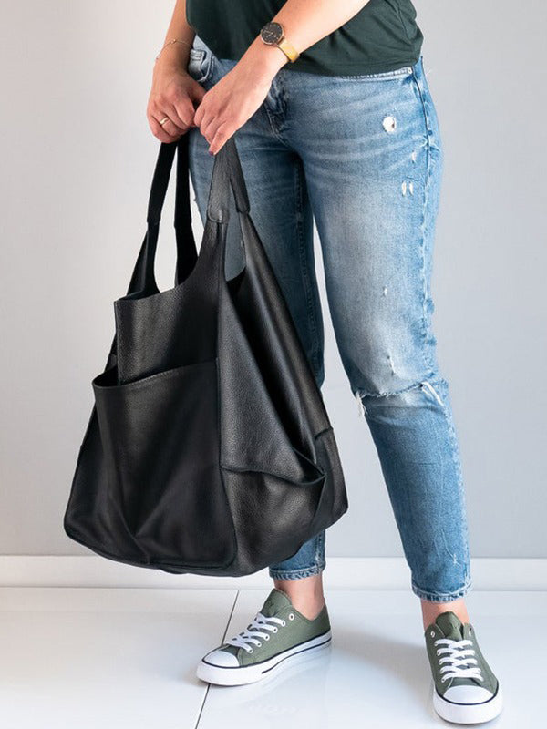 Bolsos de mano con juntas divididas