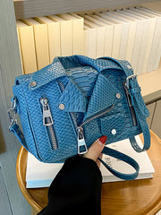 Bolsos bandolera con cremallera y cadenas asimétricas 