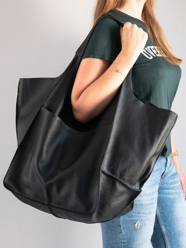 Bolsos de mano con juntas divididas