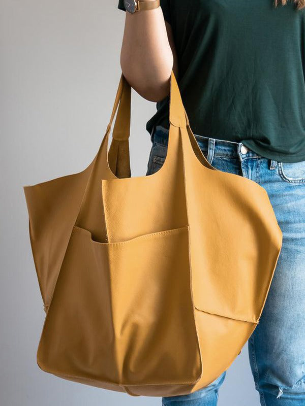 Bolsos de mano con juntas divididas